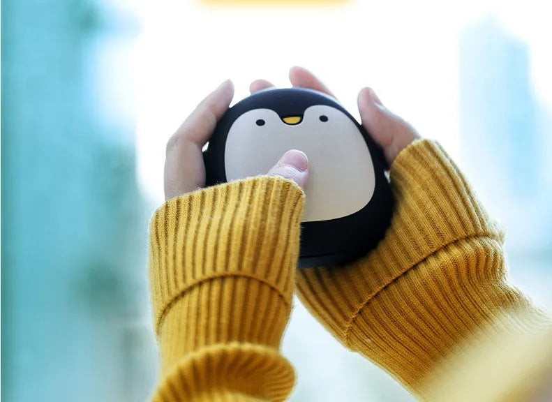 Cartoon penguin and polar bear USB rechargeable electric hand warmer showing dimensions