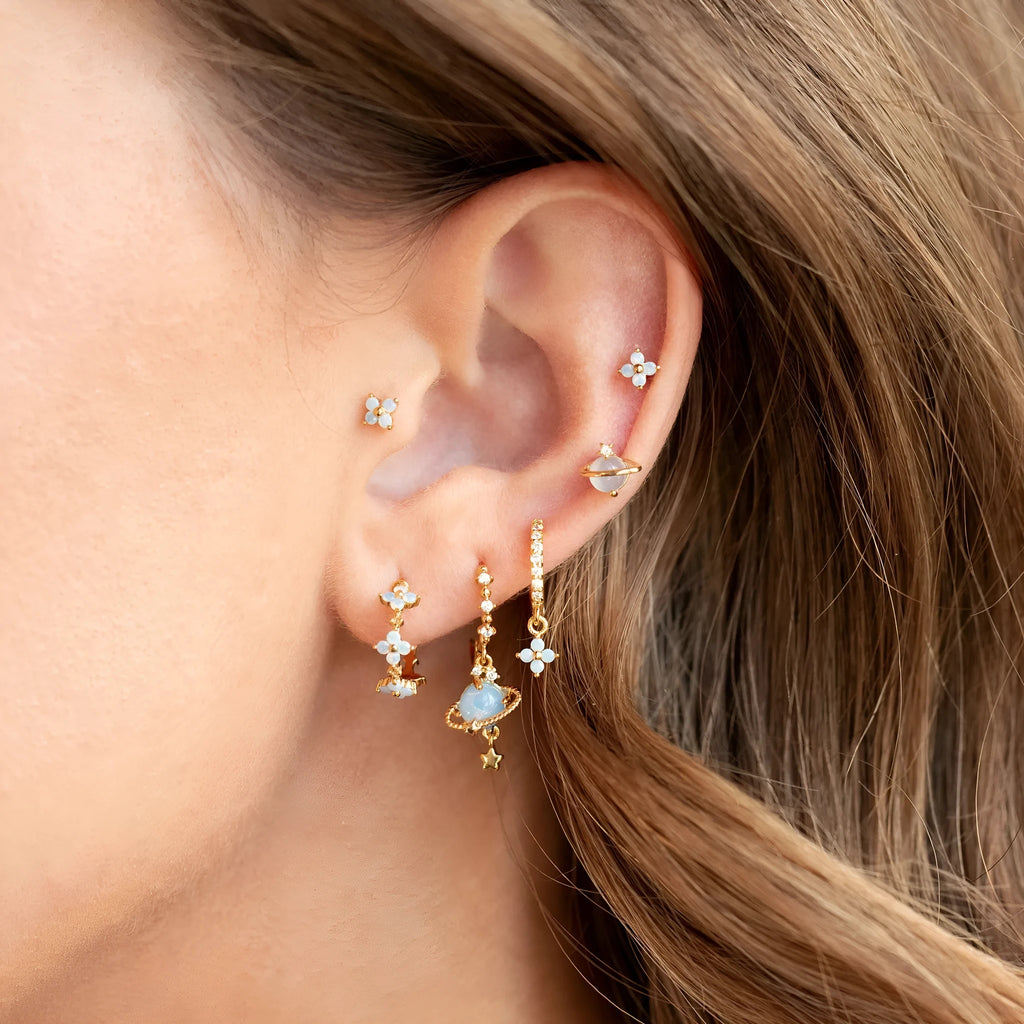 Gold and silver flower stud earrings with zircon stone mosaic centre.