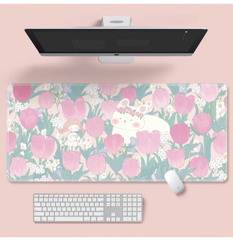 Large floral pattern mouse pad with extended keyboard area on wooden desk