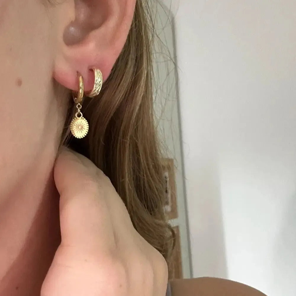 Geometric oval stainless steel ear button earrings in colour XY-EH005 for women.