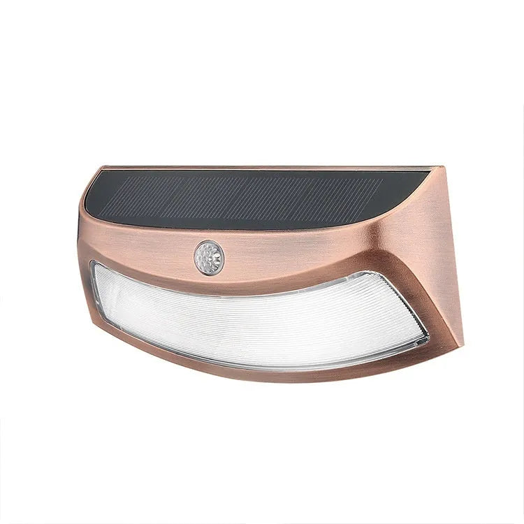 Solar outdoor wall lamp with smiling face design for garden and courtyard lighting