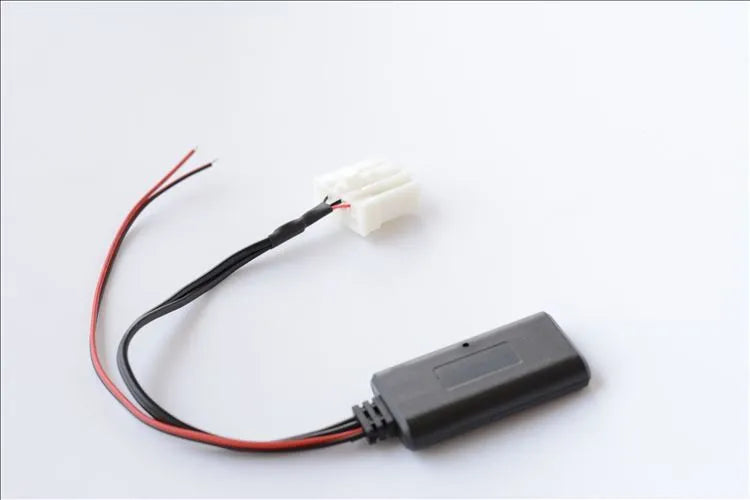 Black Bluetooth audio interface cable for Mazda cars compatible with 2006-2012 M3 and M6 models.