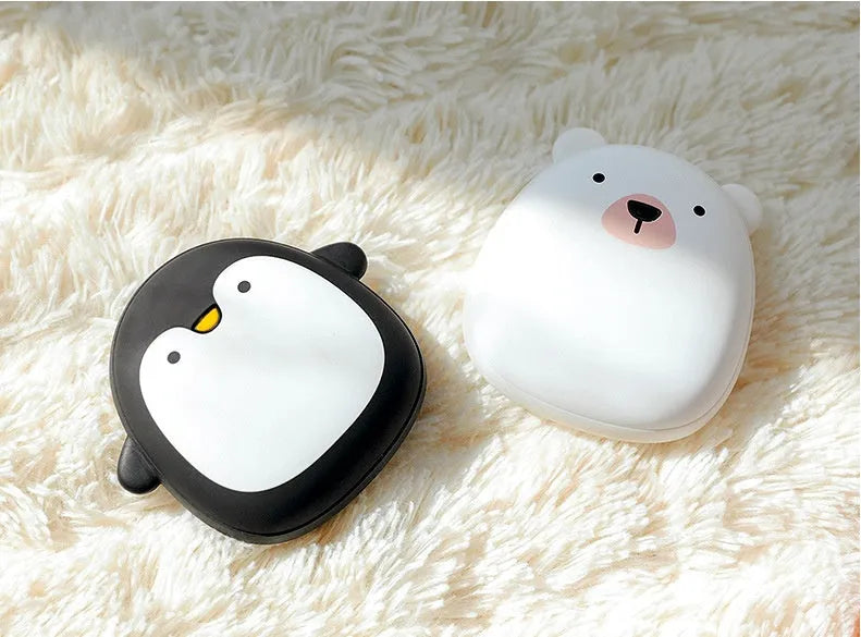 Cartoon penguin and polar bear USB rechargeable electric hand warmer showing dimensions