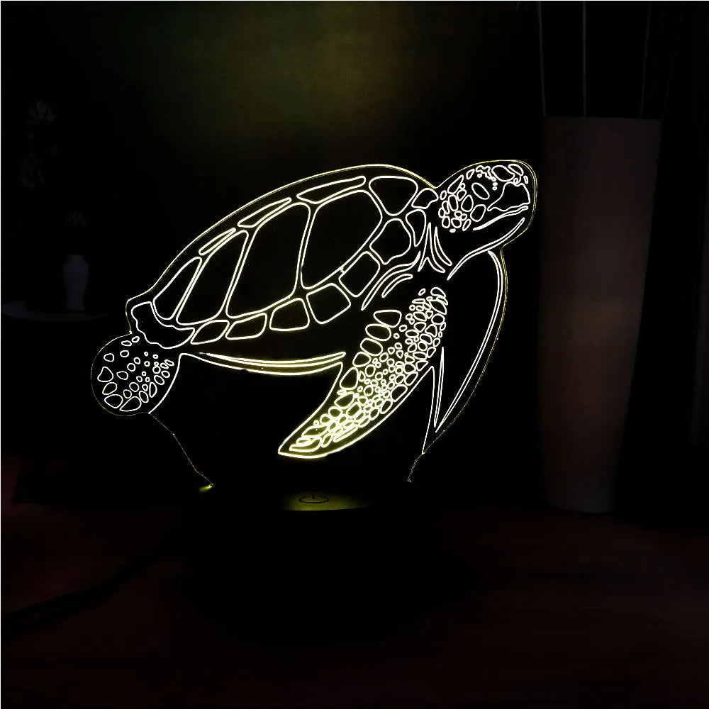 3D acrylic LED turtle night light showing colour-changing glow and remote control