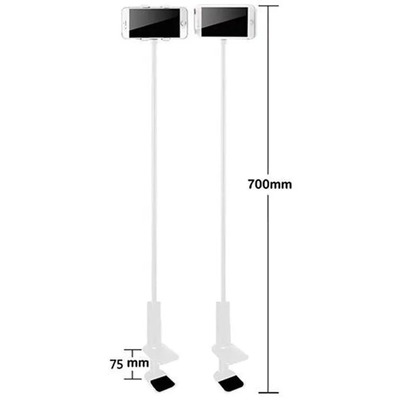 Black flexible phone tablet mount holder with suction base and bendy magnalium arm on a desk.