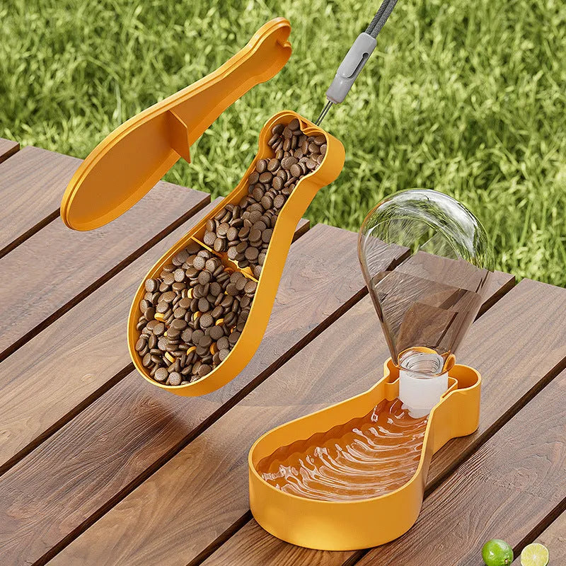 Orange and white portable pet water feeder showing water bottle and food container compartments