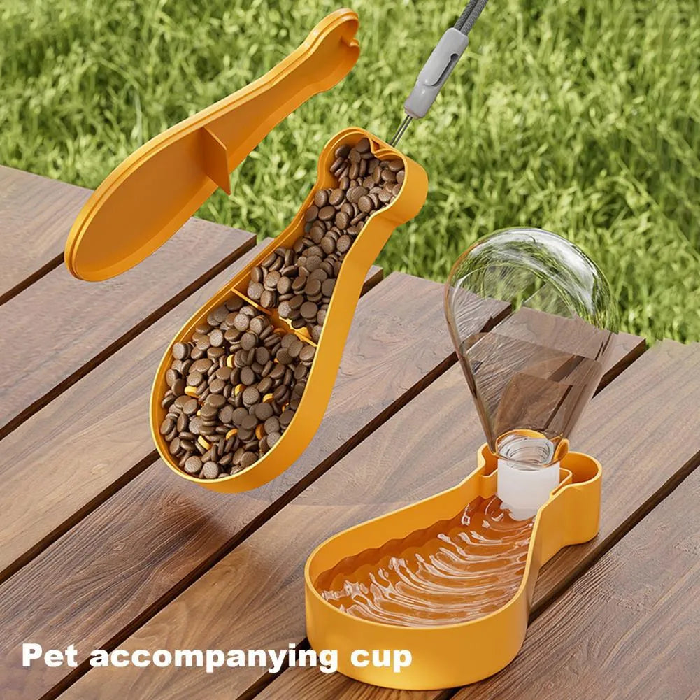 Orange and white portable pet water feeder showing water bottle and food container compartments