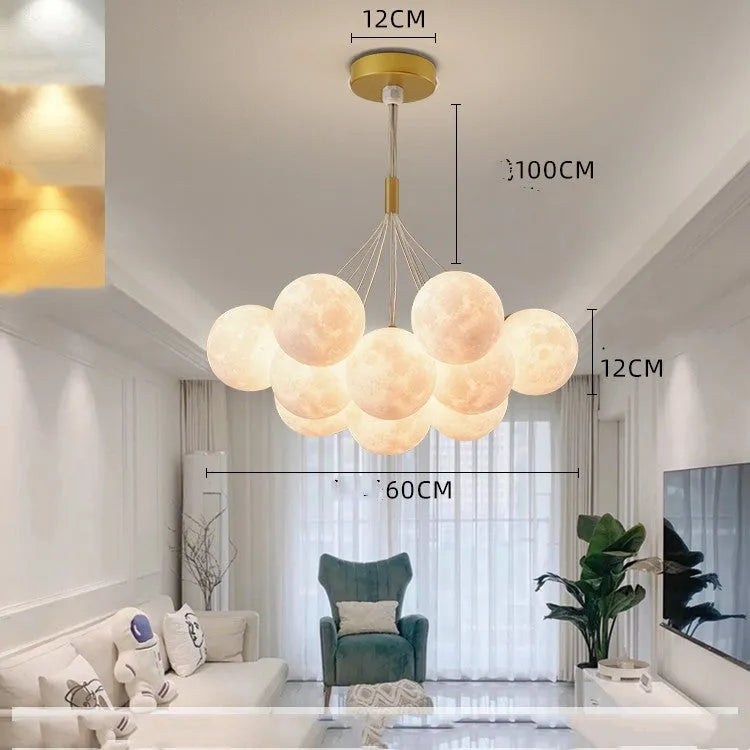 Nordic moon bubble chandelier with gold finish and spherical decorative elements for bedroom ceiling lighting