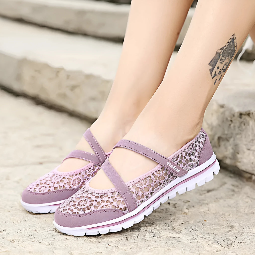 Women's beige lace-up casual flat shoes with mesh upper and round toe.