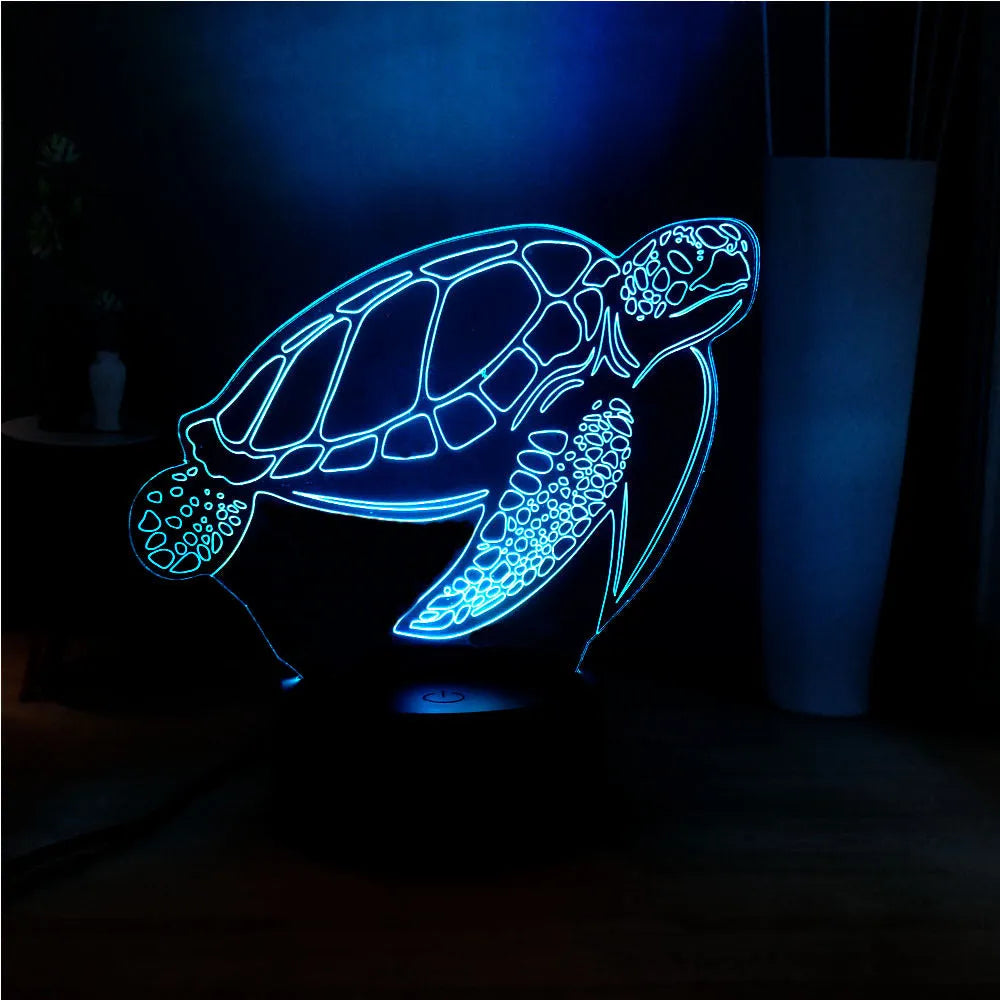 3D acrylic LED turtle night light showing colour-changing glow and remote control