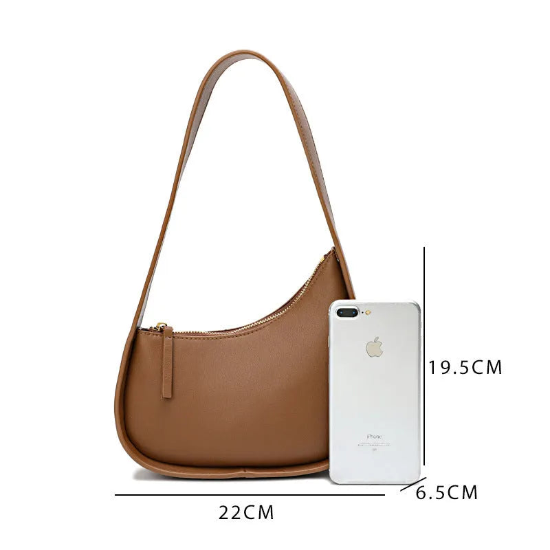 Women's genuine leather half-moon shoulder handbag with wide strap in caramel colour