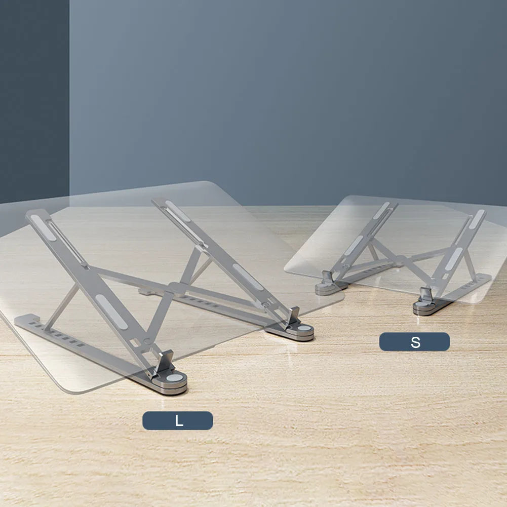 Aluminium laptop stand in silver, folded flat next to an open laptop showing its adjustable height mechanism.