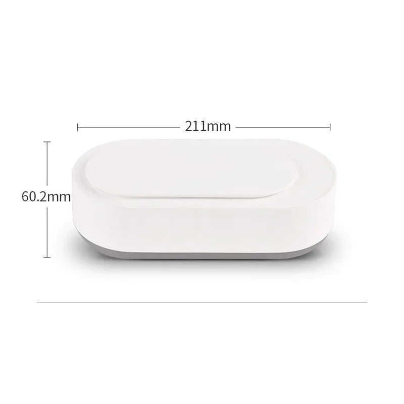 White portable ultrasonic cleaning machine with digital display and stainless steel tank.