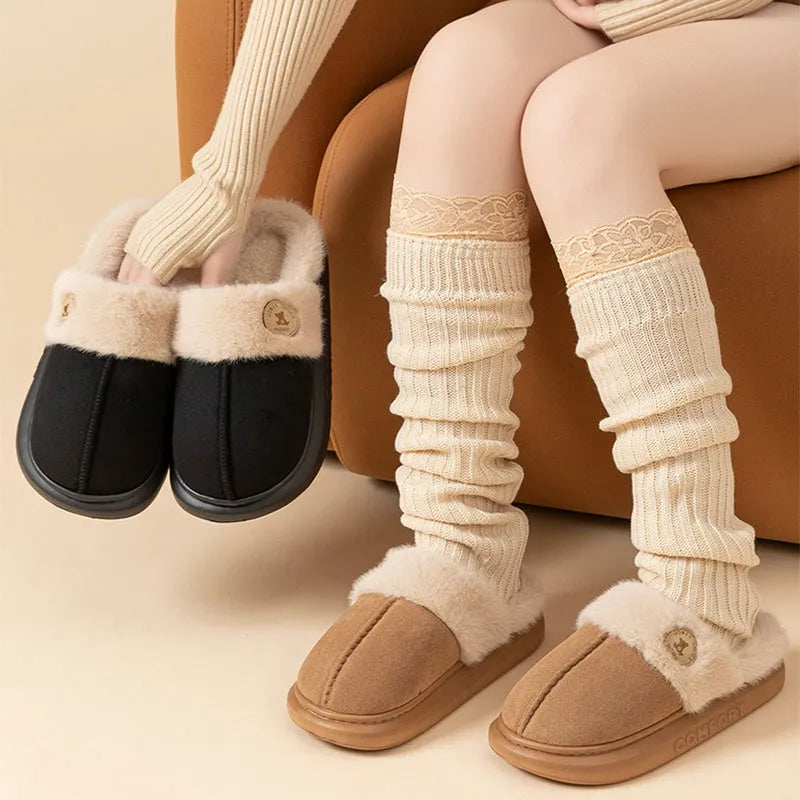 Fleece-lined winter slippers with PVC sole in various colours showing car stitching detail