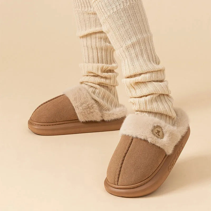 Fleece-lined winter slippers with PVC sole in various colours showing car stitching detail