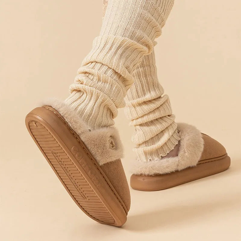 Fleece-lined winter slippers with PVC sole in various colours showing car stitching detail