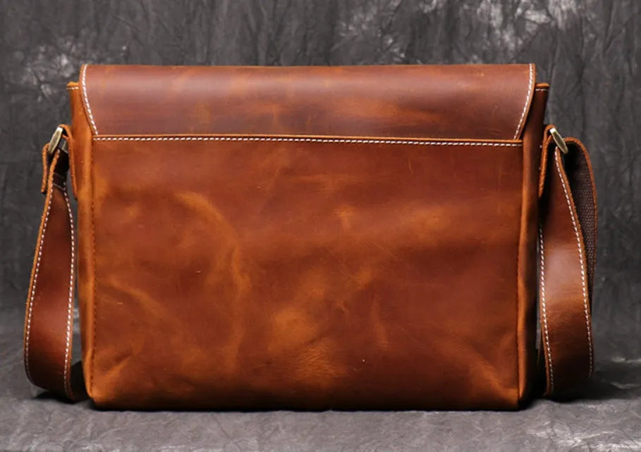 Men's vintage brown leather messenger bag with flap cover and adjustable shoulder strap