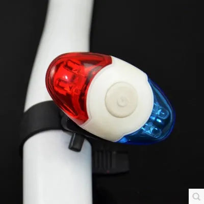 Red and blue LED bicycle tail light with adjustable mounting base