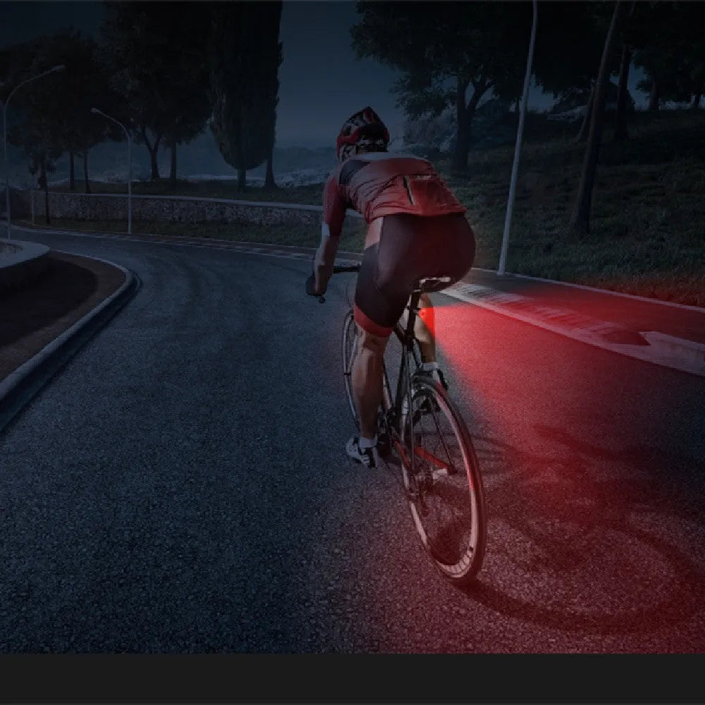 Black aluminium alloy smart brake sensing USB charging bicycle taillight showing dimensions