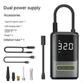 Black handheld wireless digital tyre inflator with LED display and flexible hose on a grey background.