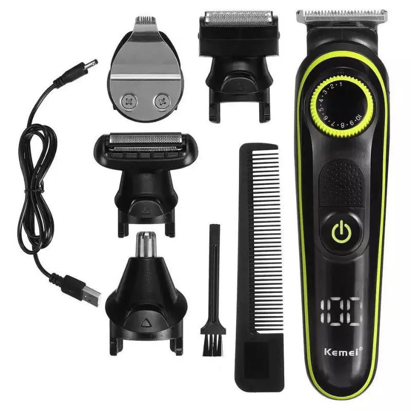 Black KM-696 USB rechargeable electric hair clipper set with stainless steel blades and cleaning brush.
