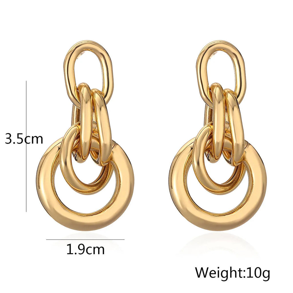Gold geometric earrings with irregular shape and high-profile design for women