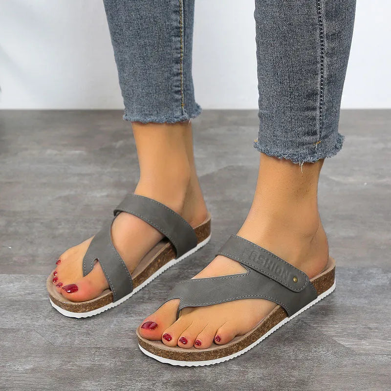 Women's blue thick-soled flip-flops with flat toe ring design on artificial PU upper