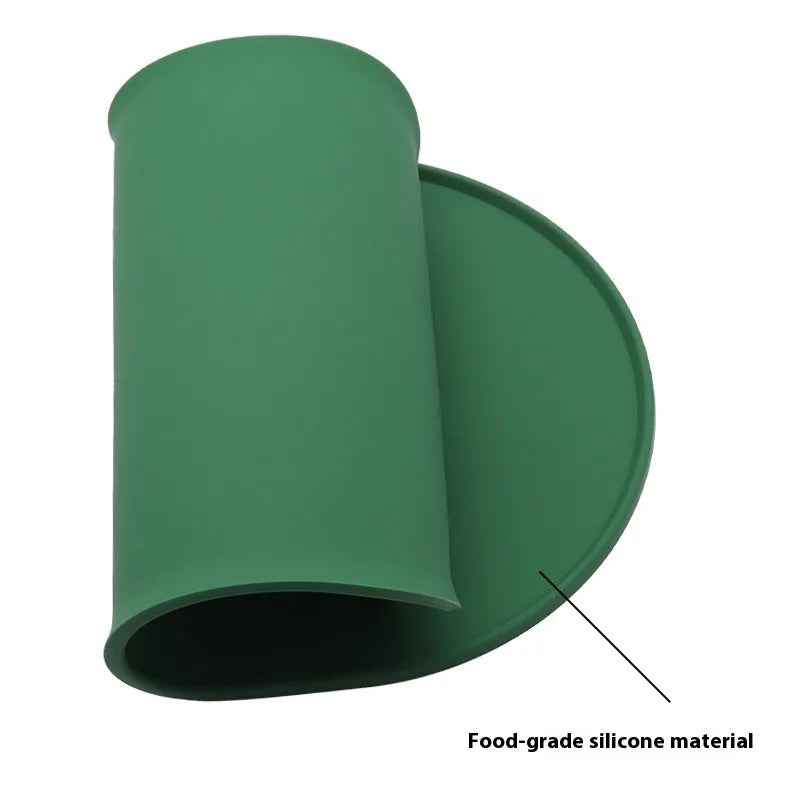 Silicone cat feeding placemat in beige colour showing non-slip underside and waterproof surface.