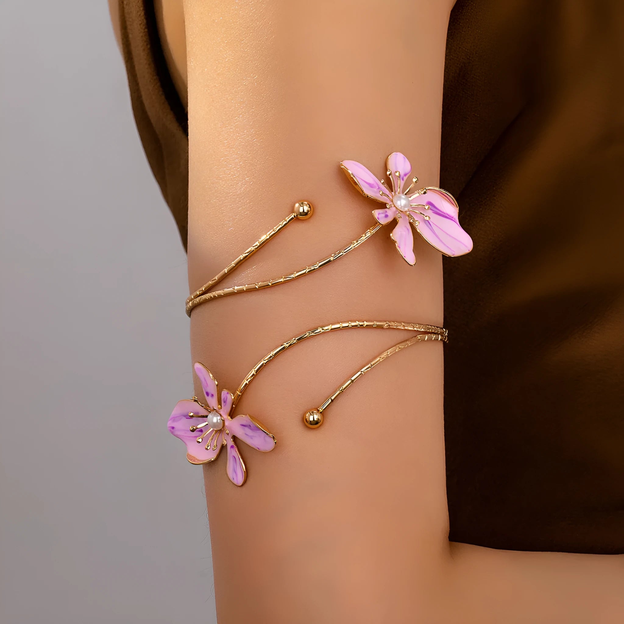 Alloy arm ring with hollow armband pattern in pink and purple colour options