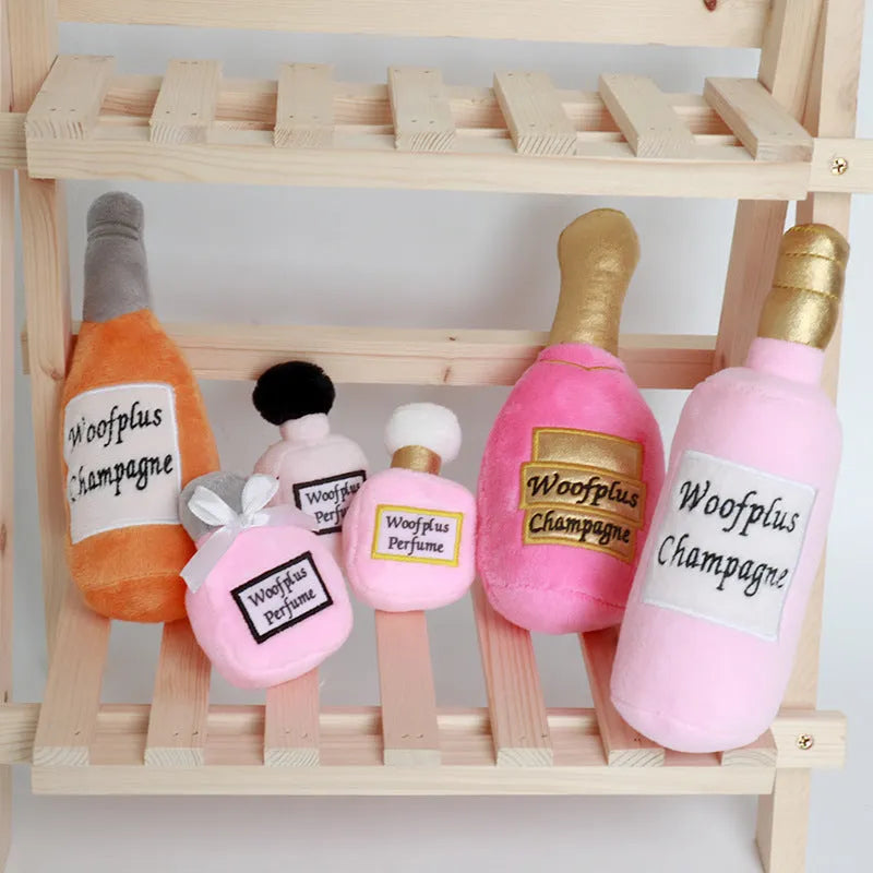 Plush wine bottle shaped dog toy with squeaker in various colour options