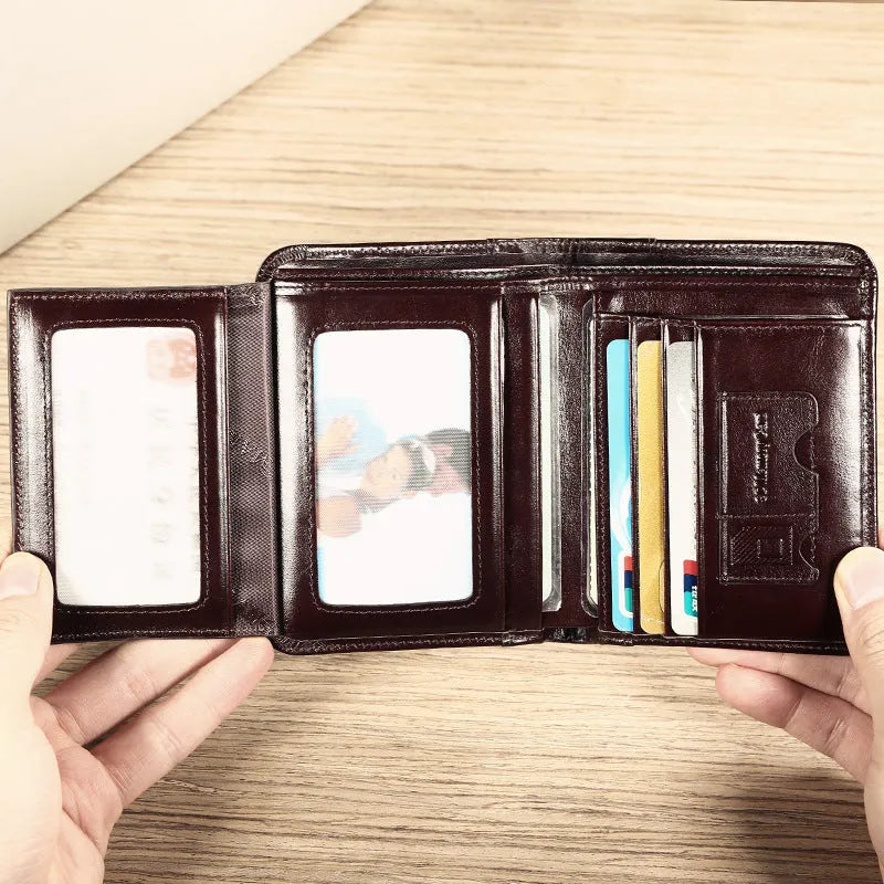 Men's black and coffee brown leather wallet open to show multiple internal card slots, note pocket, and coin compartment.
