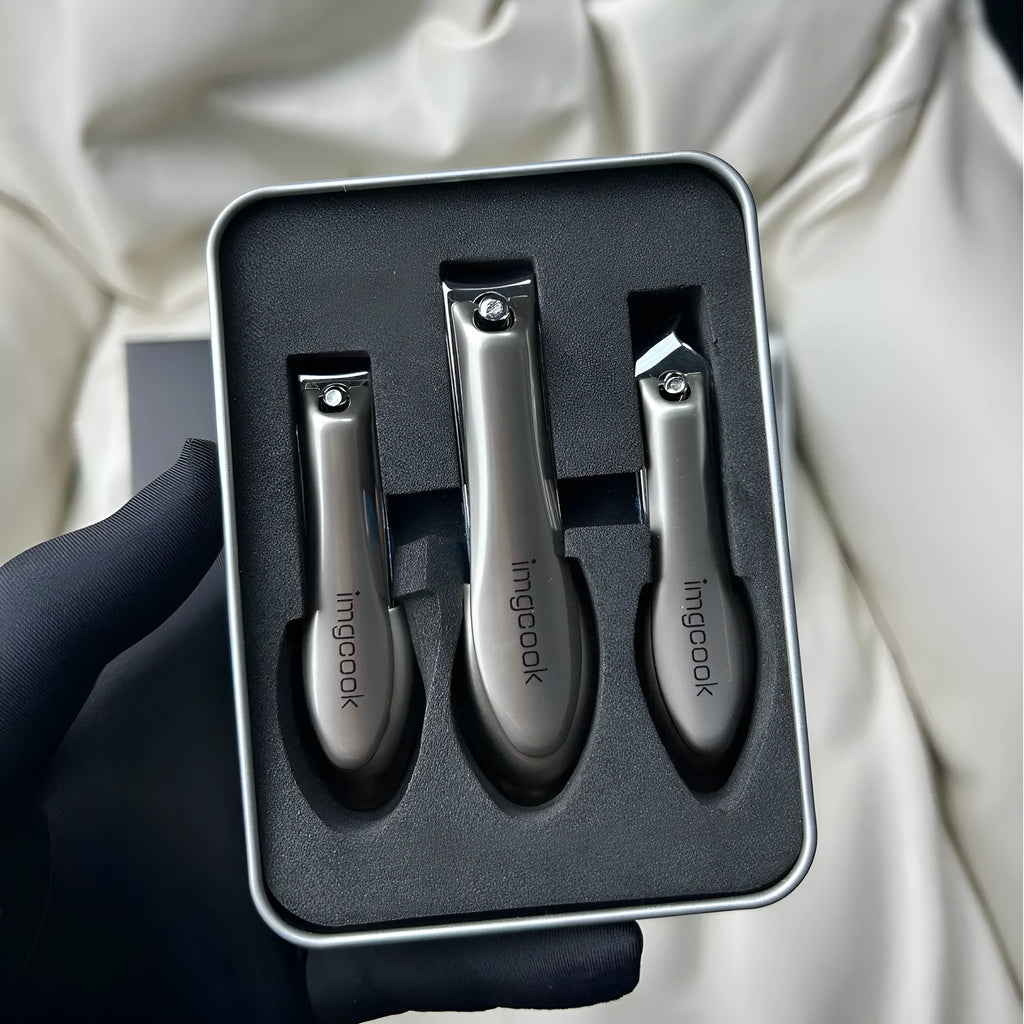 Three-piece anti-splash nail clipper set in black alloy and stainless steel for daily nail care