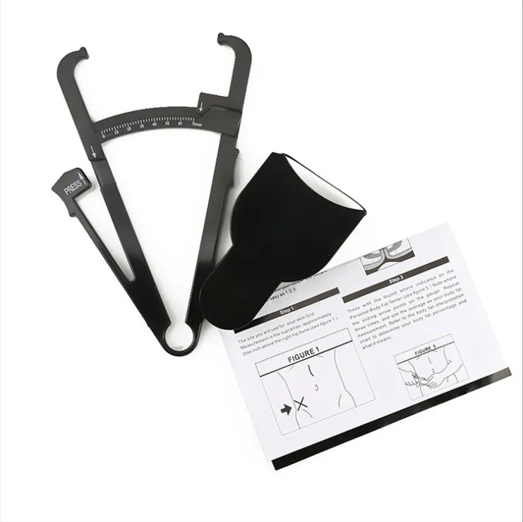 Black ABS plastic body fat caliper with measurement scale and a retractable measuring tape.