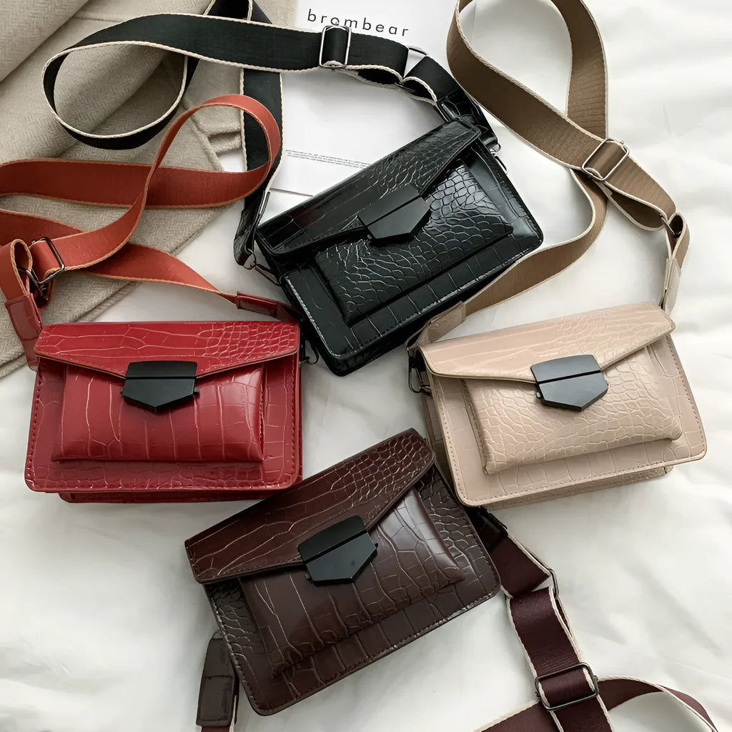 Vintage PU leather crossbody bag in black, shown with adjustable strap.