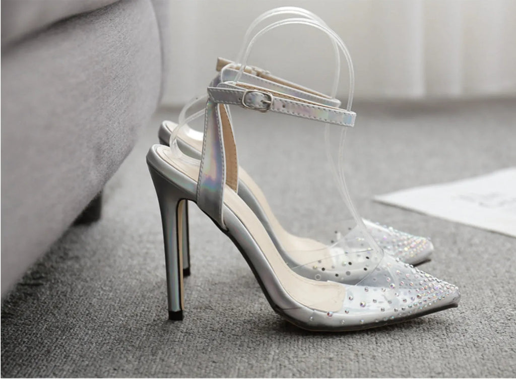 Women's pointed toe diamond sandals with a stiletto heel on a white background.