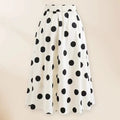 Women's black one-piece swimsuit with a white bow and round skirt, made from polyester.