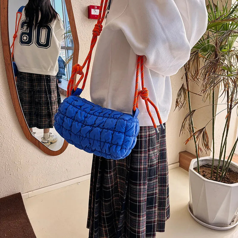 Women's lightweight nylon messenger bag in pillow shape with crossbody strap