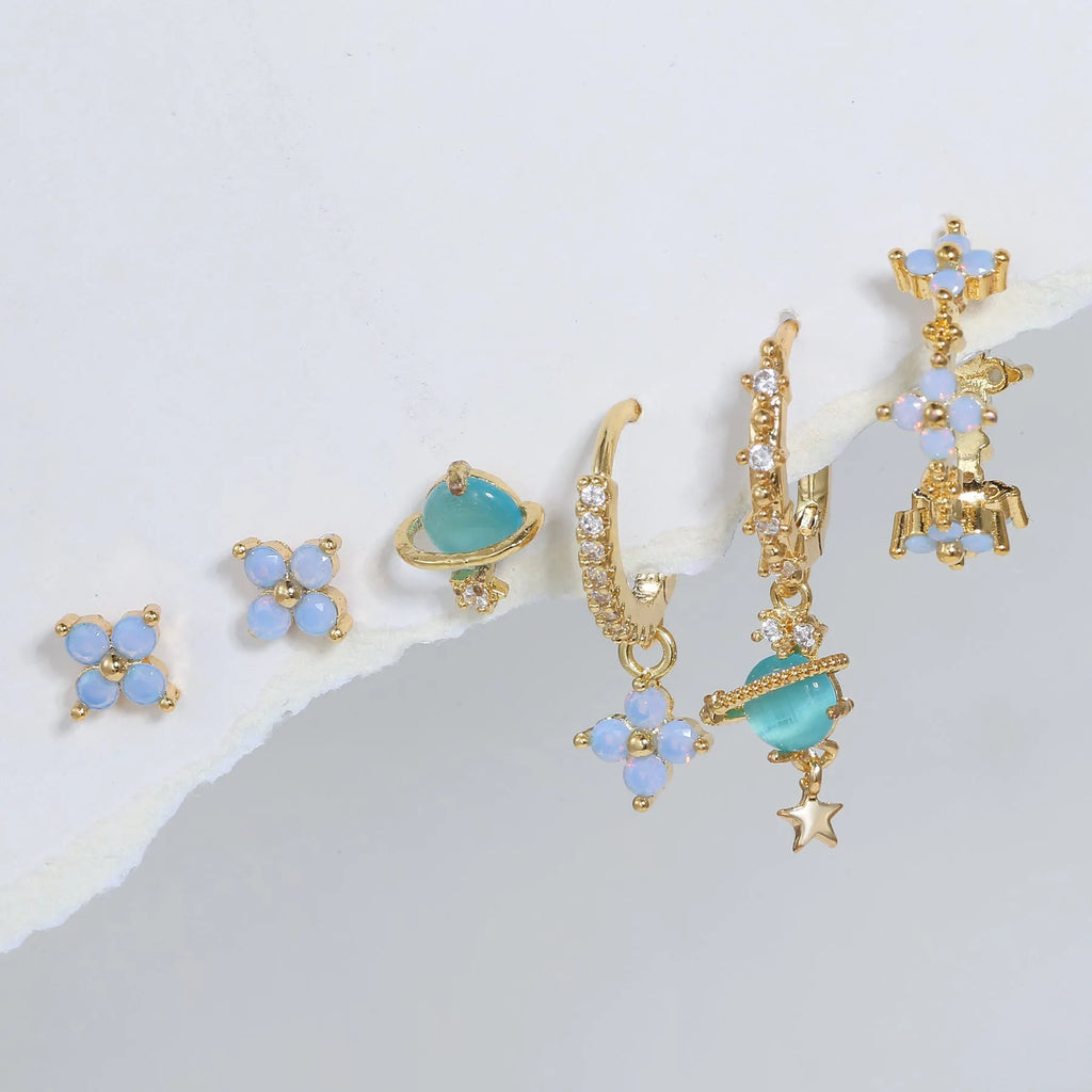 Gold and silver flower stud earrings with zircon stone mosaic centre.