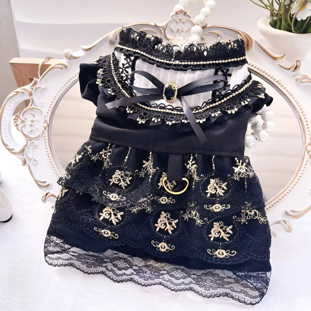 Golden gothic princess costume dress for a small dog or cat on a hanger.