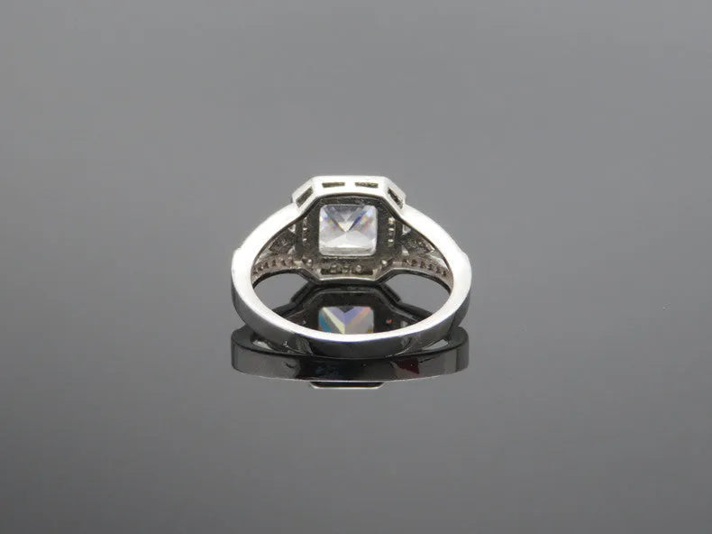 Geometric zircon ring with hollow design and platinum colour finish on solid copper