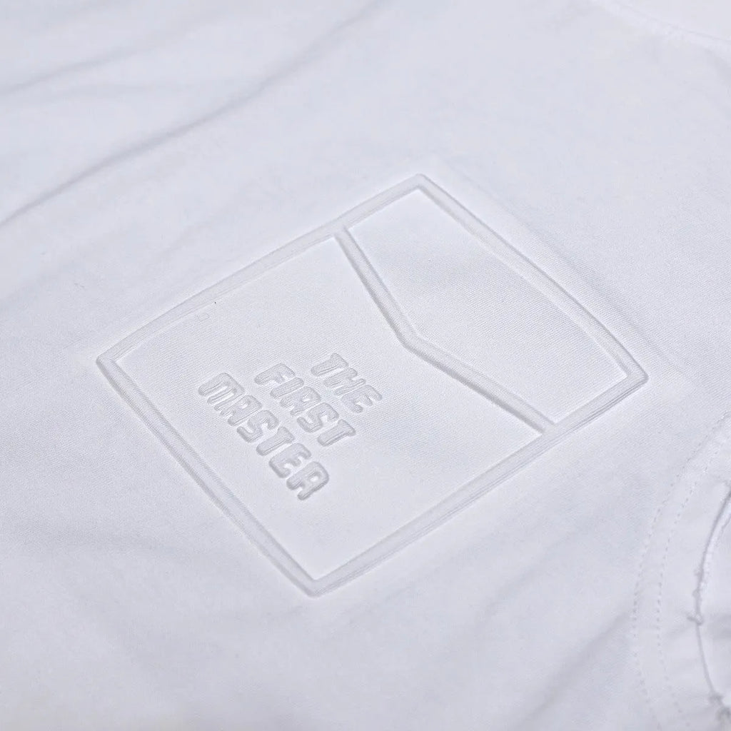 Men's solid black loose-fit cotton sleeveless t-shirt with a straight hem on a white background.