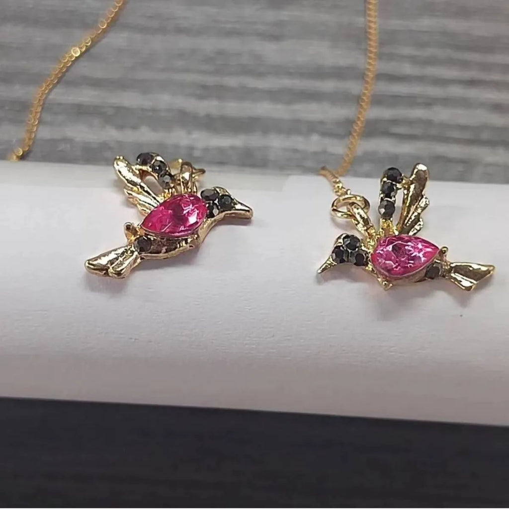 Women's long drop earrings with hanging bird pendants and zirconium crystal accents in blue colour option