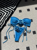 Women's solid colour tube top swimsuit with drawstring straps and briefs style bottom.