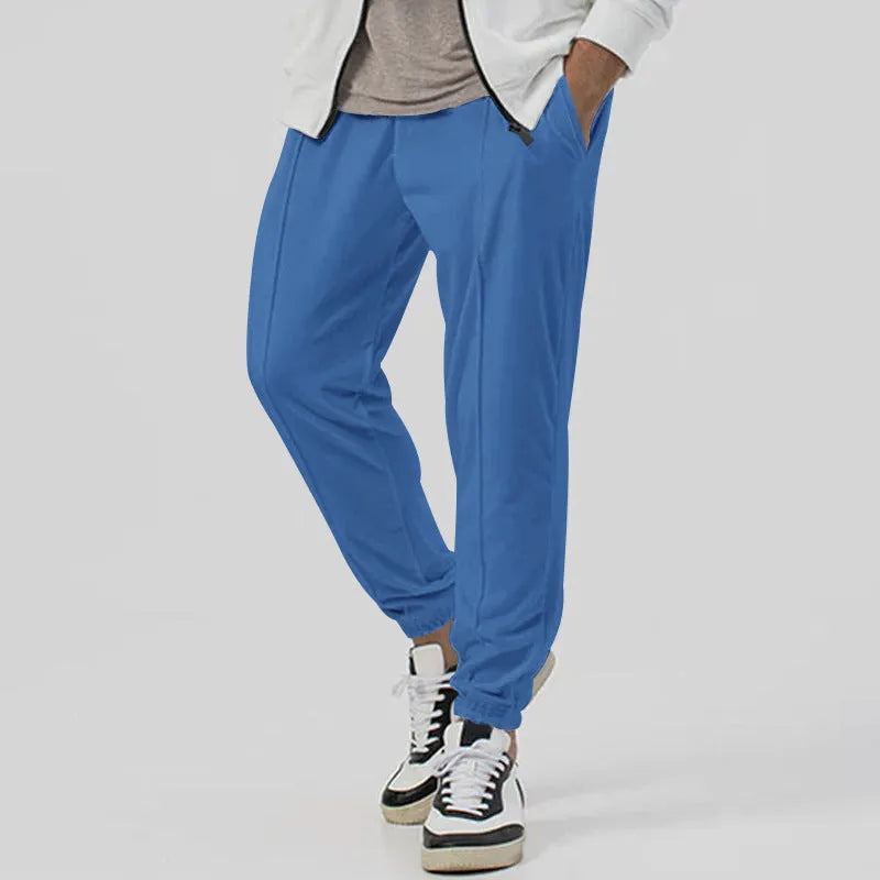 Men's grey straight-leg casual sweatpants with elastic waistband, shown laid flat.