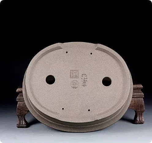 Handmade oval ceramic succulent pot with purple sand antique finish.