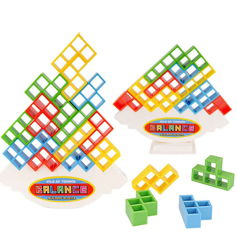 Plastic balance stacking game with 16 colourful building blocks, chassis, and base on a table.