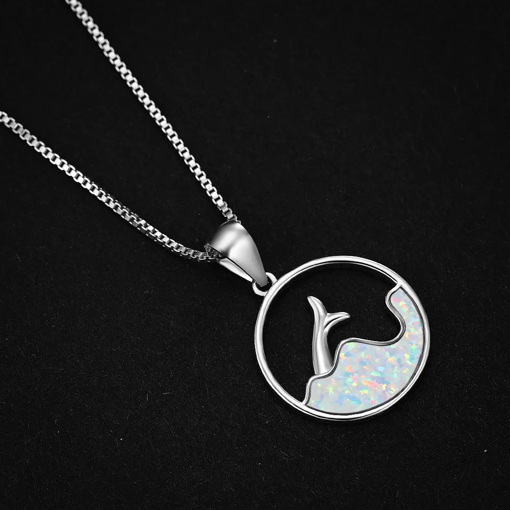 White gold electroplated copper necklace with geometric sea fishtail pendant and round opal accents