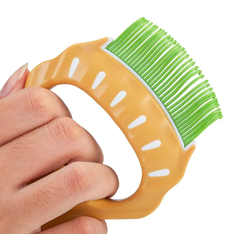 Green shell-shaped pet slicker brush with bent wire bristles and anti-slip handle on a white background.