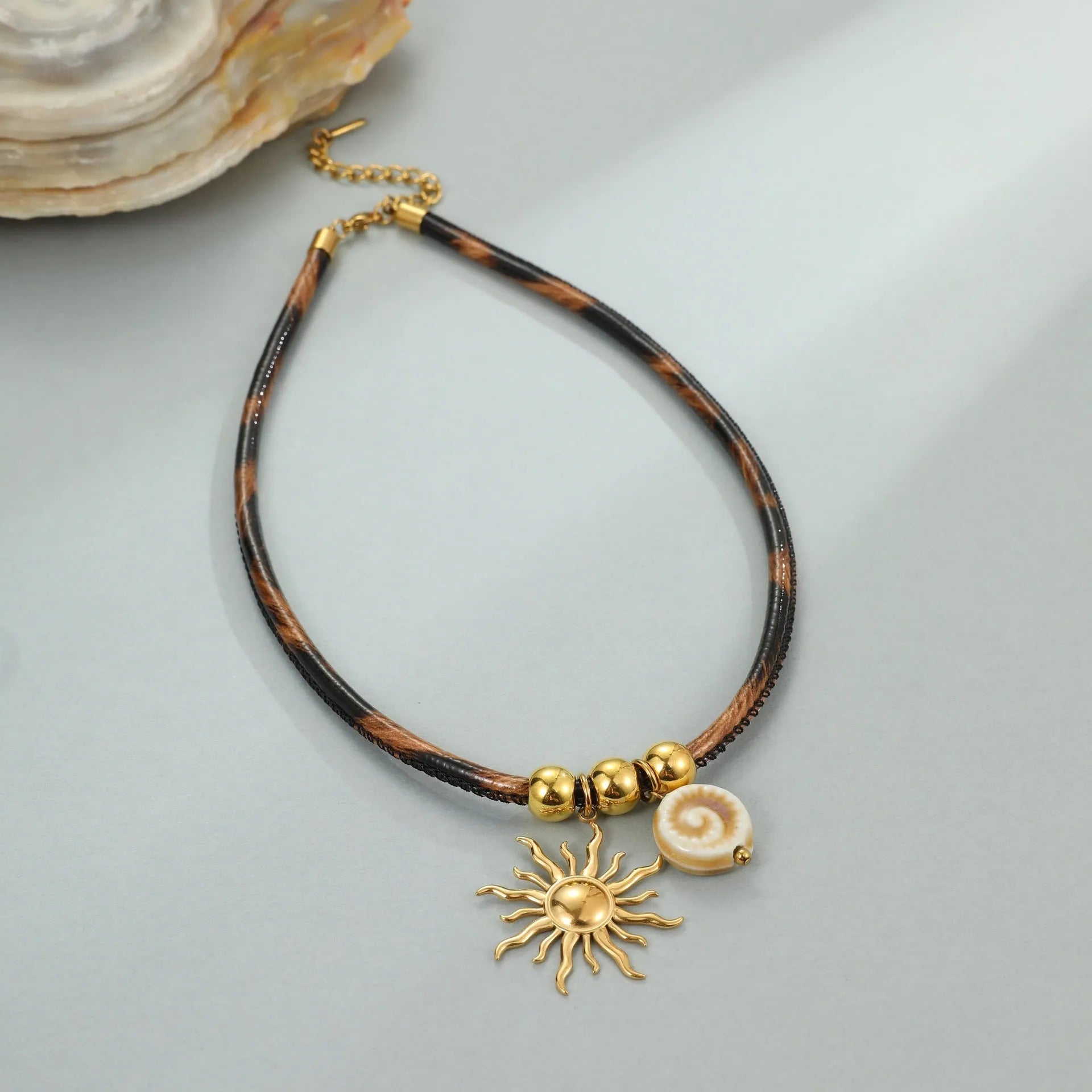 Geometric leopard design stainless steel necklace with 18K gold electroplated finish on adjustable 41-50cm chain