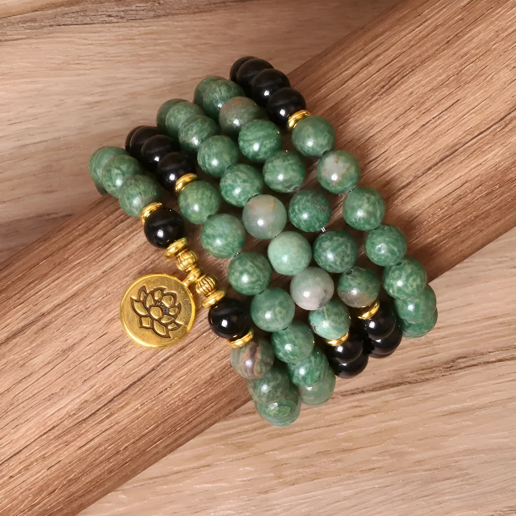 Green and black alloy beaded bracelet with elastic closure showing natural style design